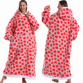 Spooky Snuggle – Hoodie-Decke mit Ärmeln
